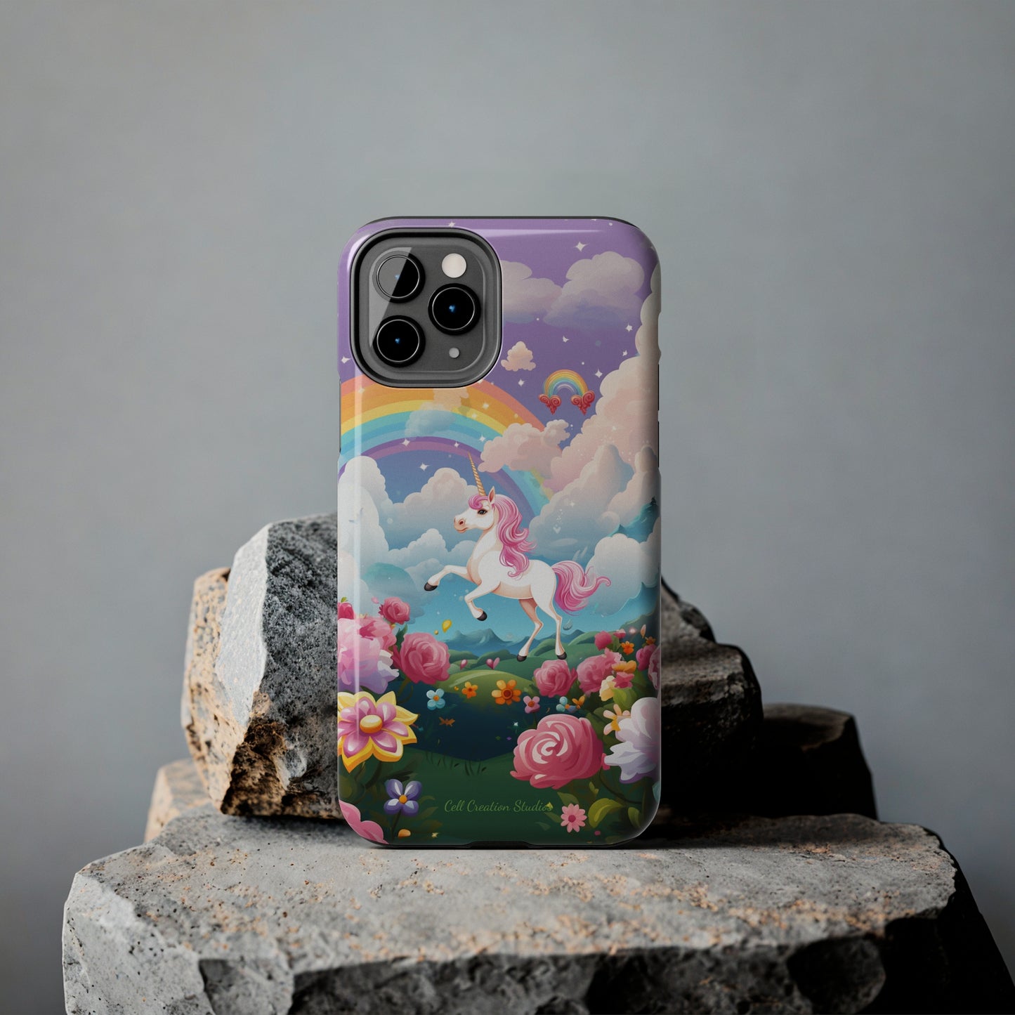 Introducing the "Floral Enchantment" Cell Phone Case – Embrace Your Imagination with a Unicorn in a Field of Flowers -Tough Phone Cases